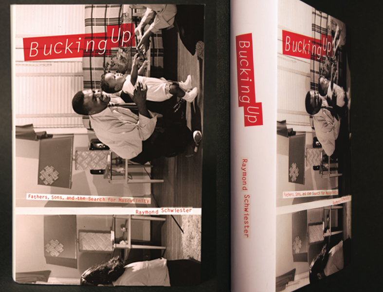 Photo of hypothetical student book cover design work from college